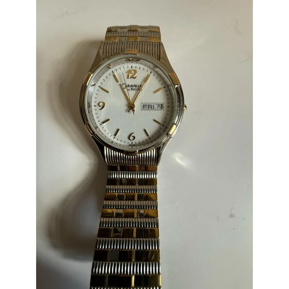Caravelle by Bulova quartz watch — excellent condition, two-tone finish.